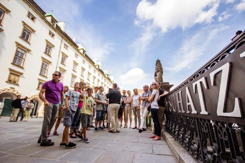 Vienna: 2 Hours Sightseeing Walking Tour - Michaelerplatz: the star-shaped Baroque plaza that sets the tone