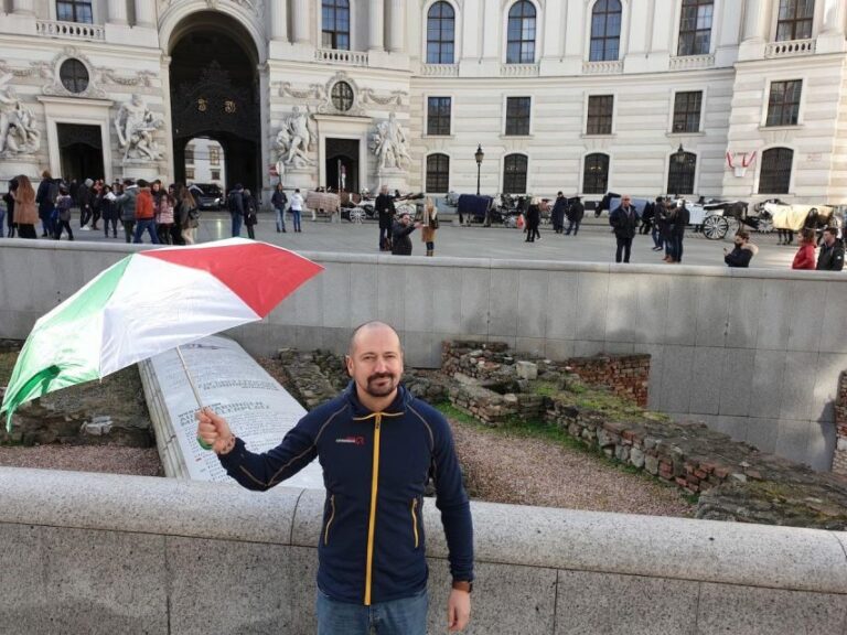 Vienna: Hofburg Palace and Principessa Sissi Tour - Starting at Josefsplatz and finding the right umbrella