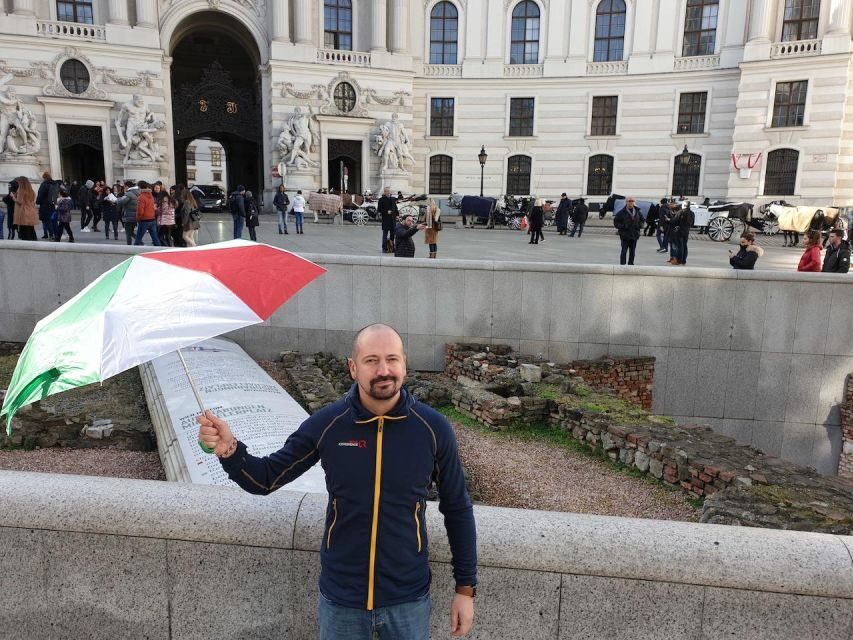 Vienna: Hofburg Palace and Principessa Sissi Tour - Starting at Josefsplatz and finding the right umbrella