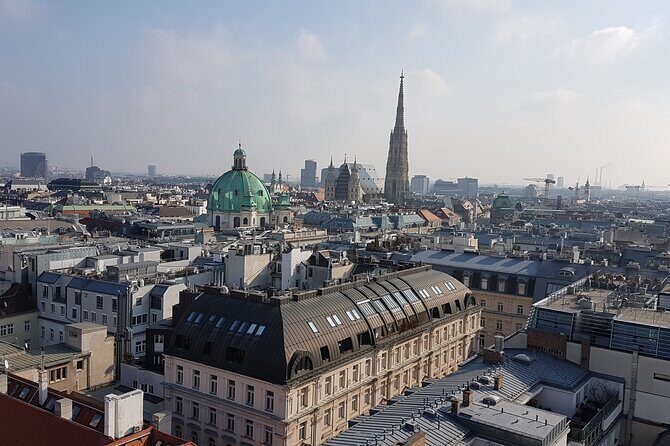Vienna Secrets Walking Tour to Backyards and Mysterious Locations - Passing the Franciscan Church façade (and catching a cat café sight)