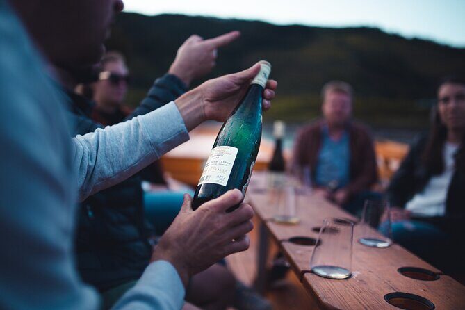 Wine tasting on traditional wooden boats in Wachau Valley - What to bring for a comfy 2-hour wooden-boat tasting